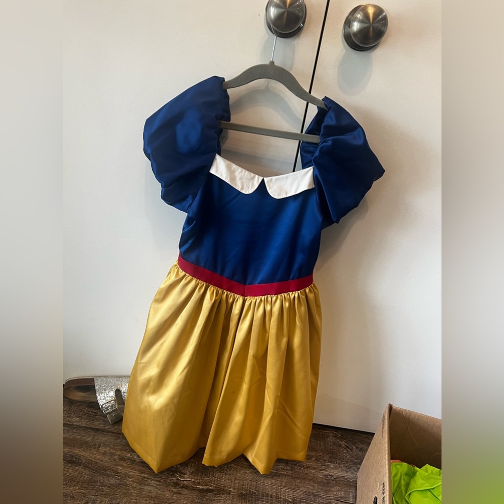 Janie and Jack size 7 Snow White dress with two small ink spots.